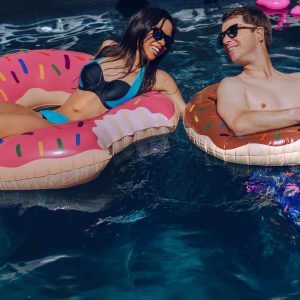Couple on swimming pool drunked